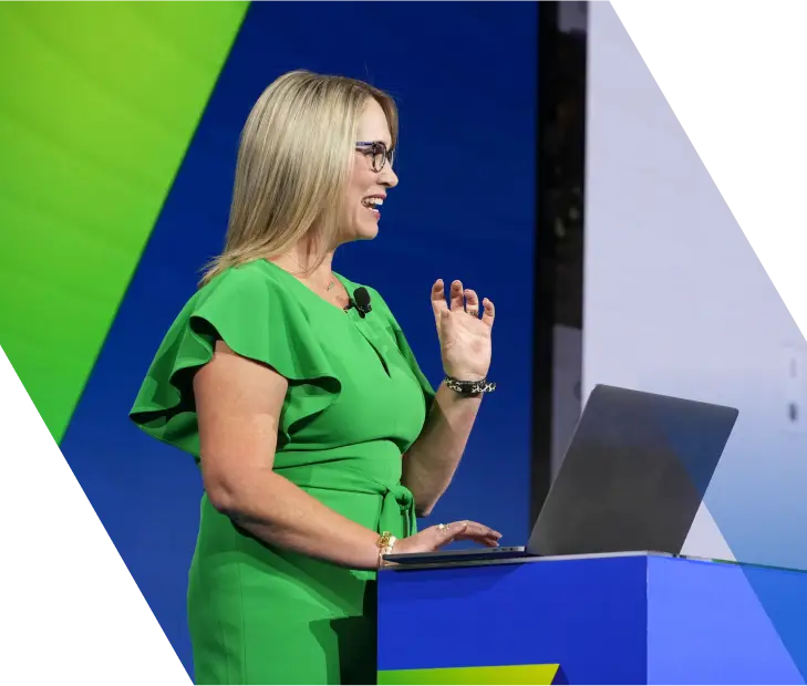 Photo of Misty Cobb presenting at a laptop